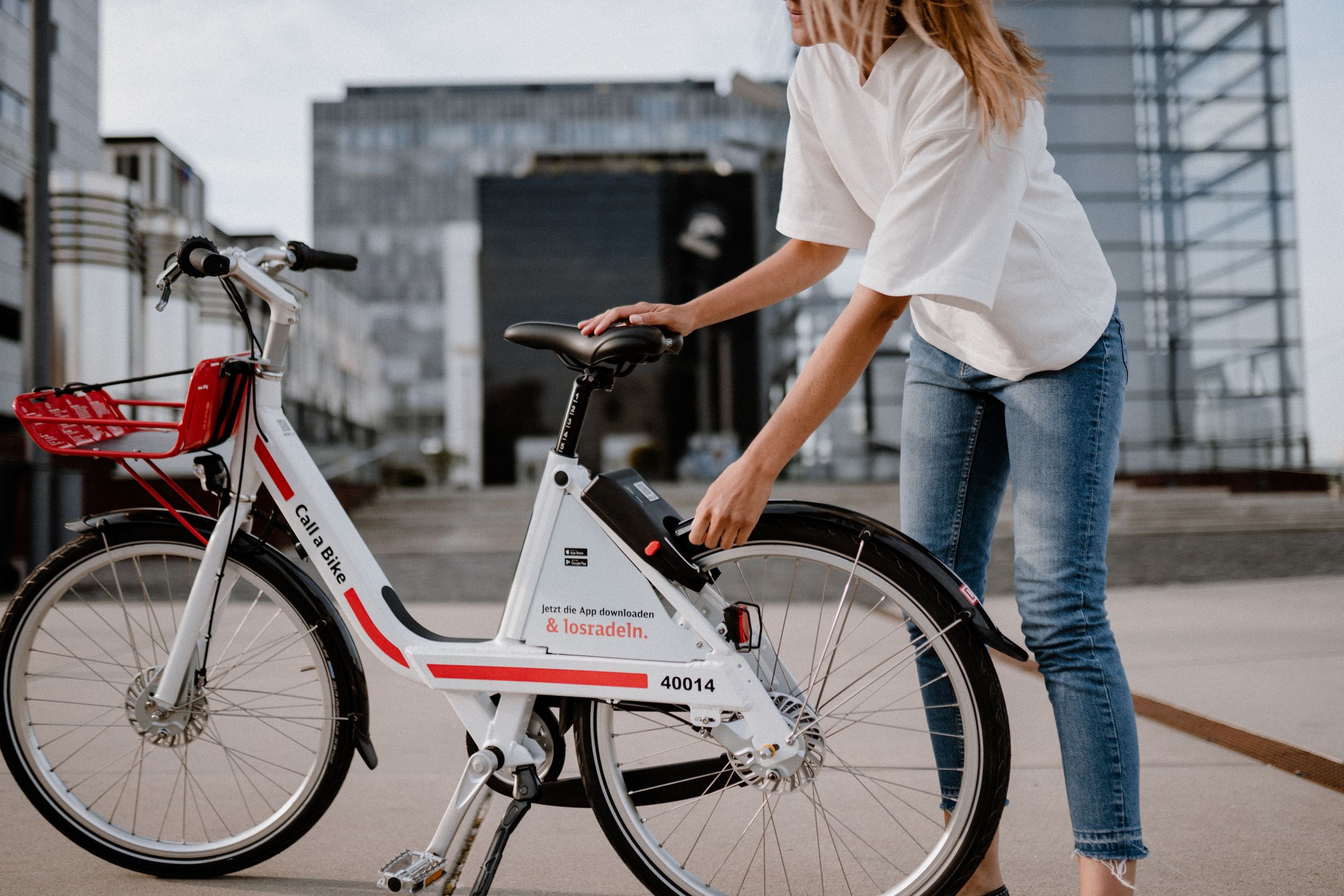 Woman parks Call a Bike